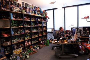 office room full of shelves with toys